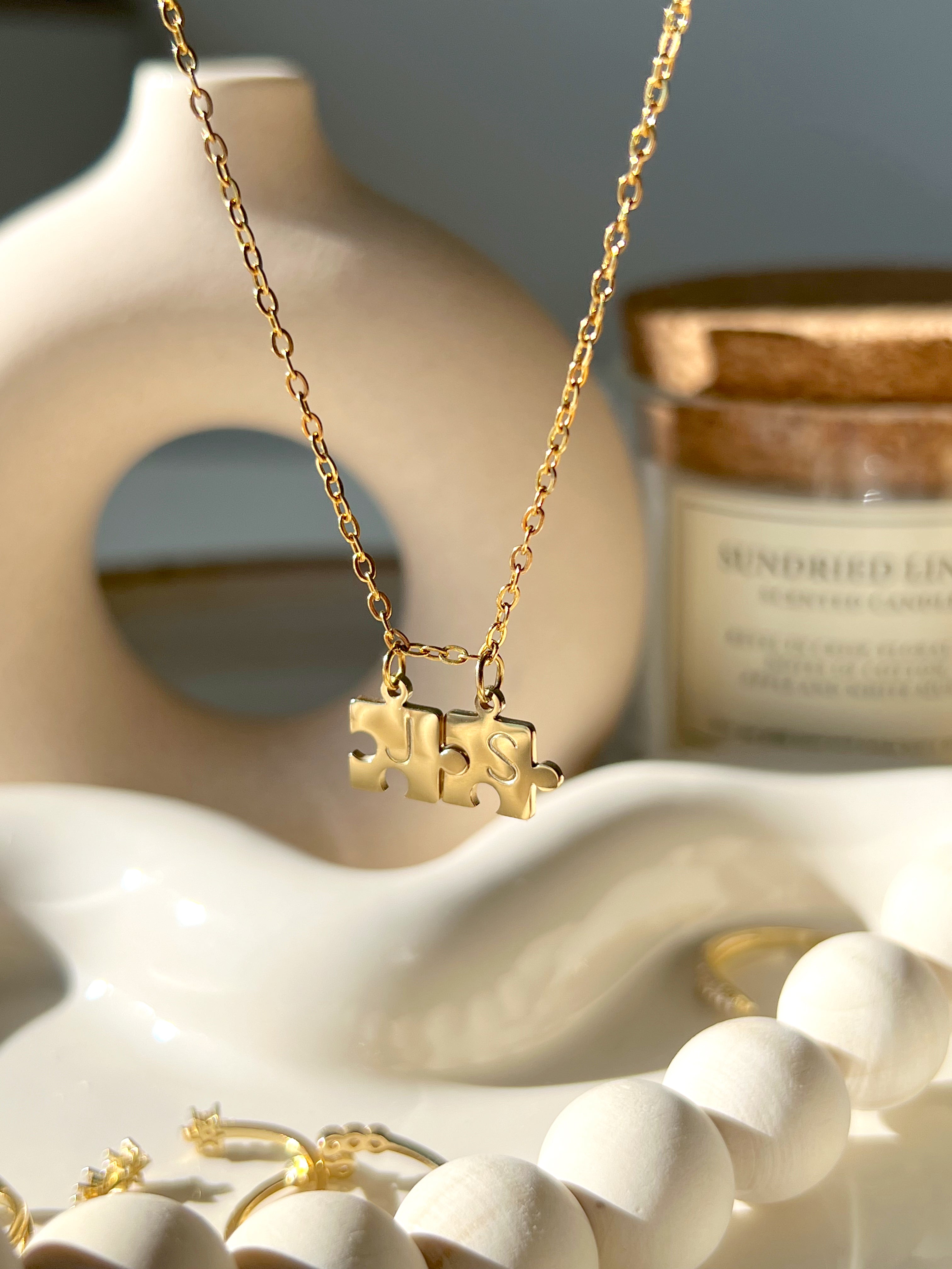 Collar de doble rompecabezas