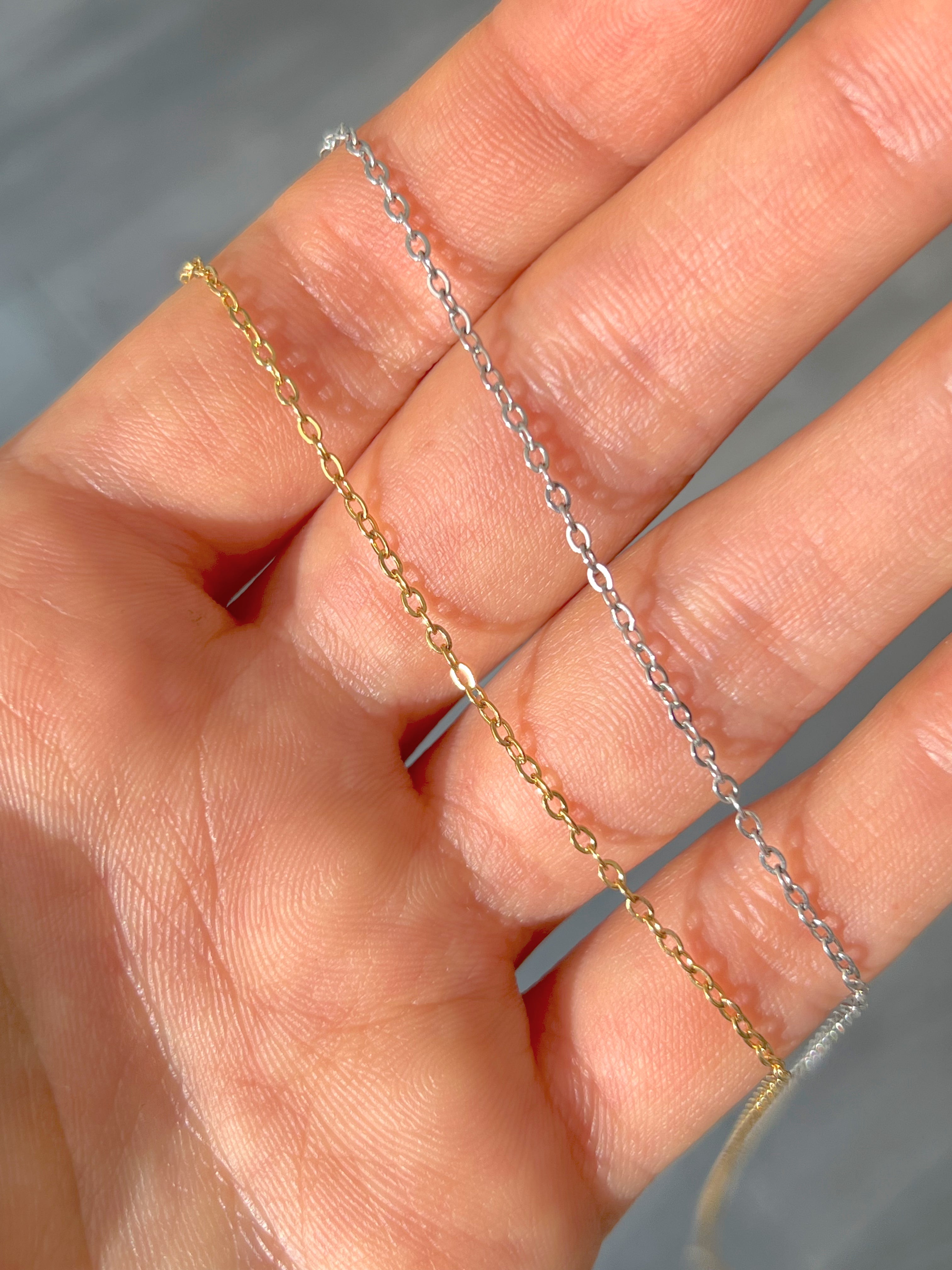 Collar con moneda inicial