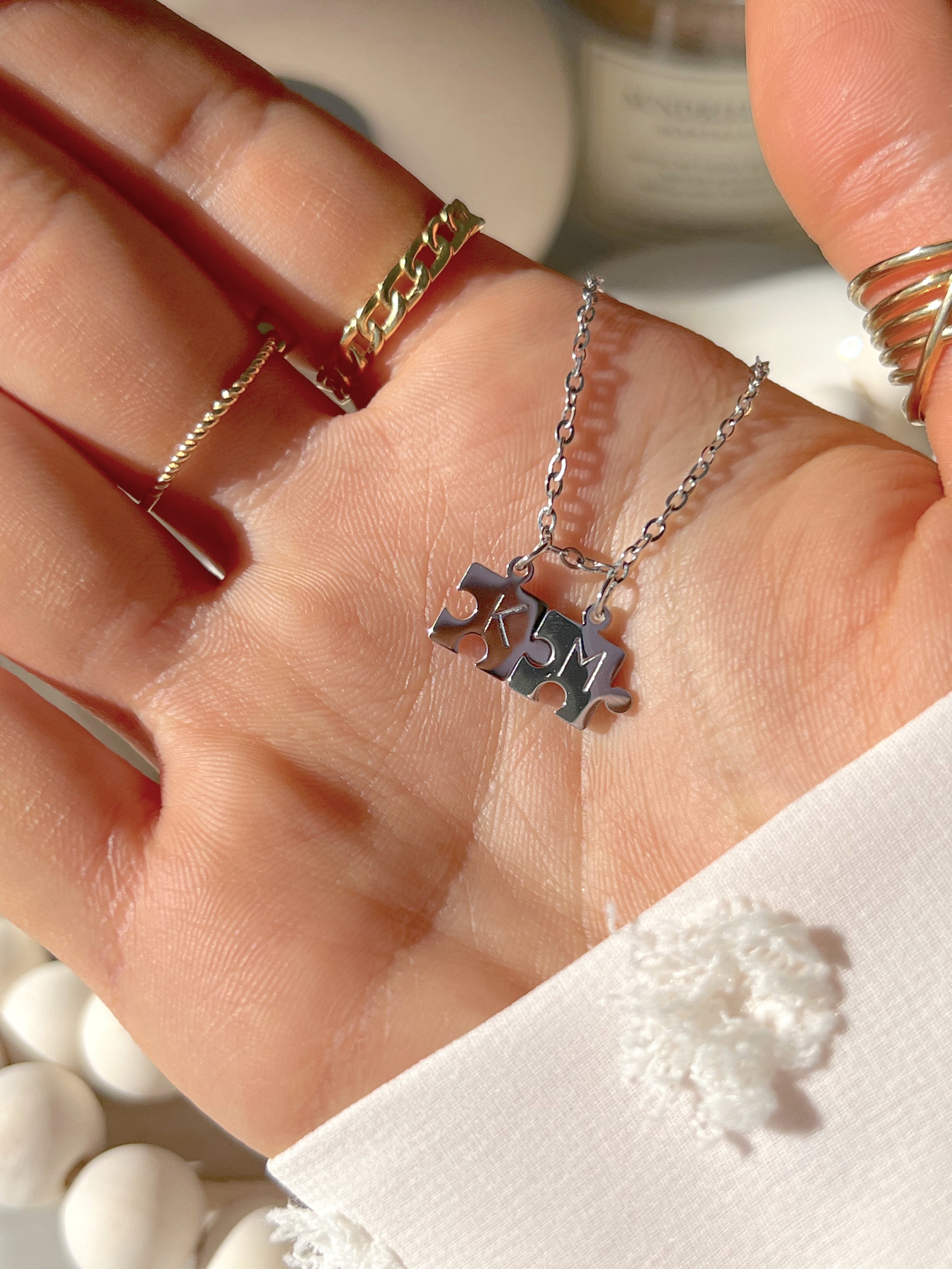 Collar de doble rompecabezas