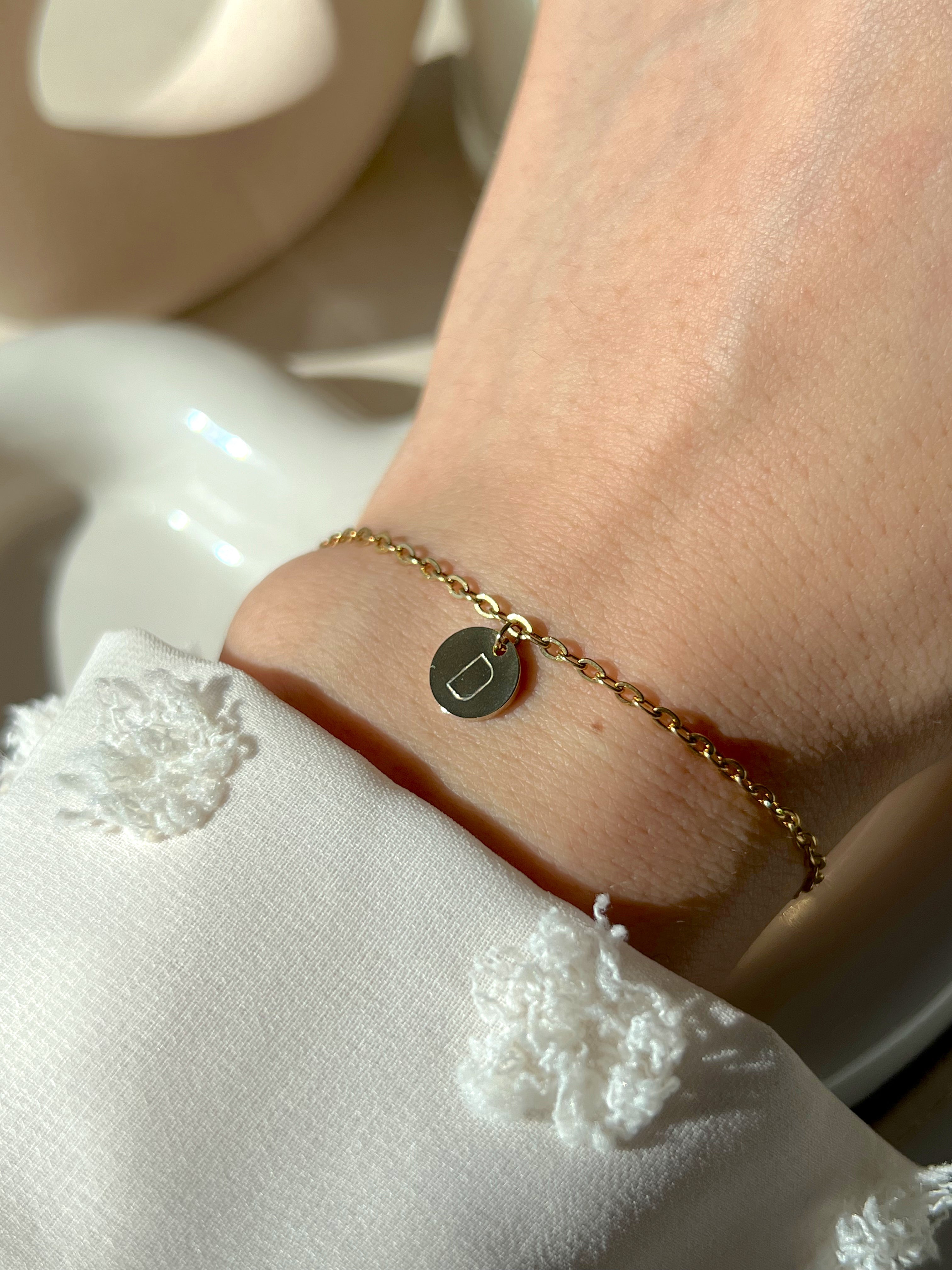 Pulsera de moneda inicial