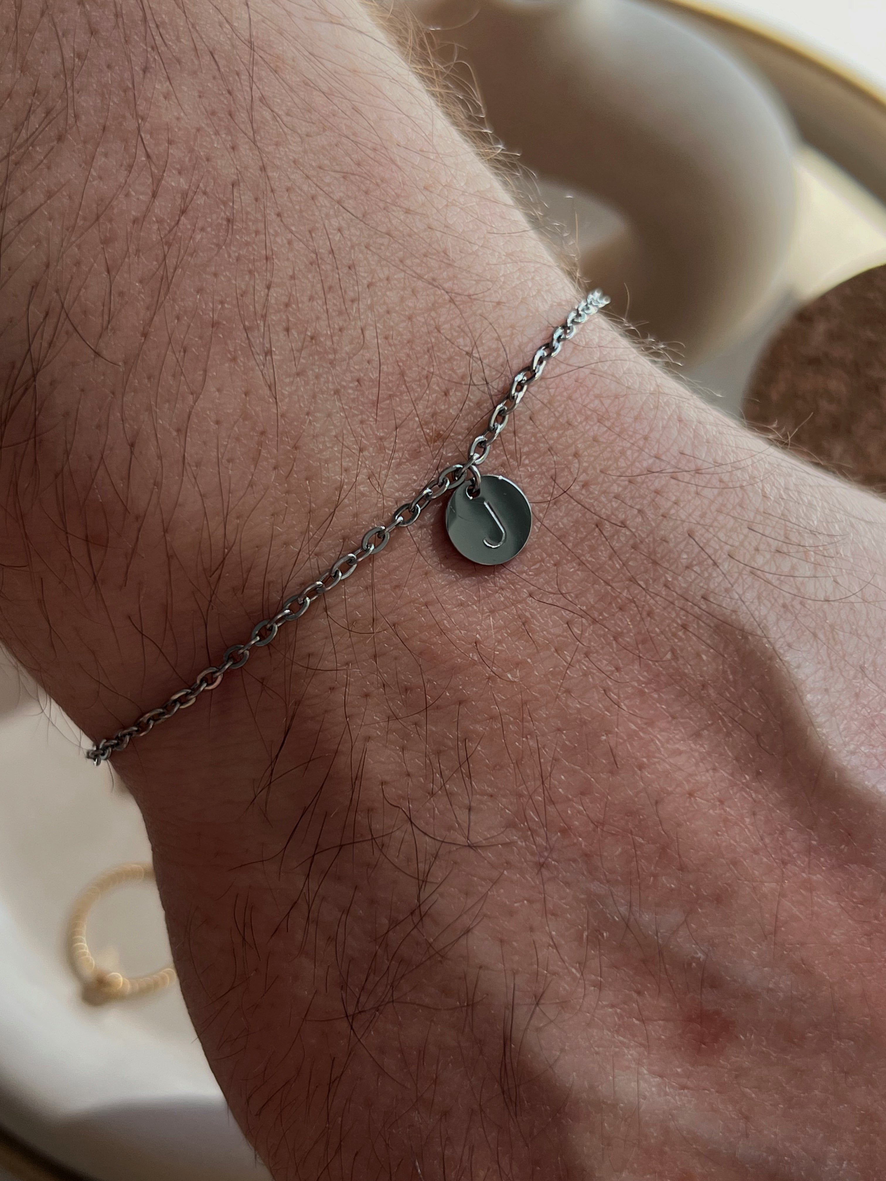 Pulsera de moneda inicial